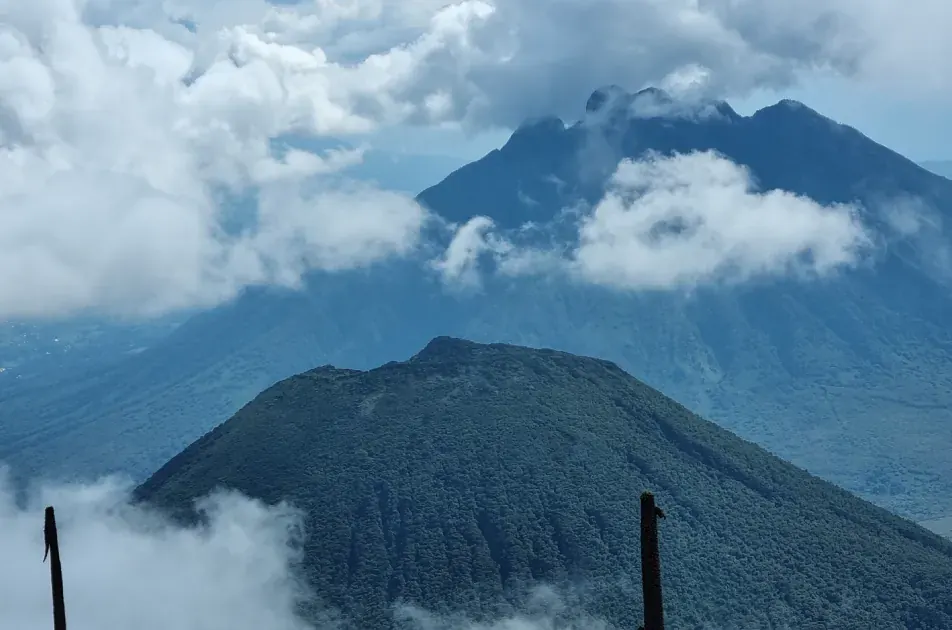 The Virunga volcanoes rising above cultivated slopes at Mgahinga, south-west Uganda
